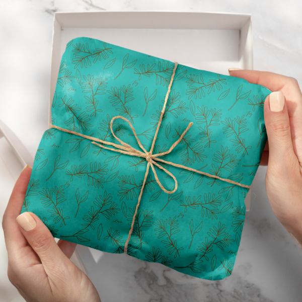 Imagen de paquete de regalo envuelto en el papel de regalo organic azul