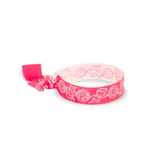 Pulsera de tela en color rosa con motivos divertidos, para regalar un detalle solidario de UNICEF